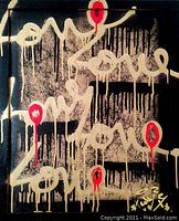 Close front view showing black textured background, gold ‘love’ script and red drips