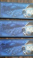 Three Canadian Millennium Quarter sets in original blue-themed cardboard displays featuring a snowy village scene.