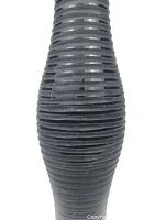 Close-up of the vase's side showing its textured, ribbed horizontal stripe design in black glass.