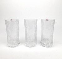 Front view of set of three clear textured glass drinking vessels