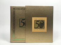 Front view of gold textured slipcase and book cover with the 50th Anniversary emblem of The Hobbit by J.R.R. Tolkien.