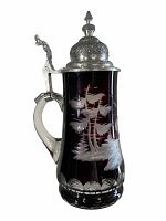 Front view showing ruby to clear cut glass body with engraved tree motif and pewter lid