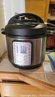 Front view of Instant Pot Duo Plus 6 quart showing overall appliance and control panel.