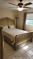 Full assembled view showing headboard, footboard, side rails and bedding (not included)