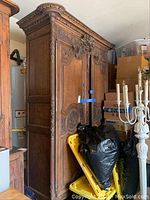 Full frontal view of the armoire showing overall design and scale