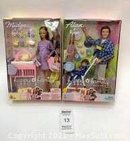 Both boxed Barbie Happy Family sets, Midge on left and Alan on right, showing packaging condition and included accessories.