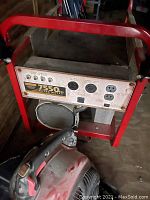 Front control panel of Generac 7550 EXL generator showing outlets and controls