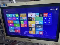 Screen displaying Windows 8 Start menu on Lenovo all-in-one computer