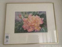 Framed watercolour painting showing the entire artwork of a rose with a mat and gold frame.