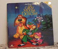 Front cover of the LaserDisc featuring the main characters from The Great Mouse Detective animated movie.