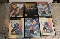 Photo of six Final Fantasy PS2 game cases arranged on a surface, showing front covers. Titles visible include Final Fantasy X, Final Fantasy X-2, Final Fantasy XII, and Final Fantasy XIII.