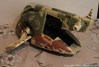 Photo of the Hasbro 1996 Star Wars Slave 1 ship toy from a side angle showing open compartment and worn paint.