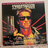 Front cover of The Terminator Laserdisc widescreen edition featuring Arnold Schwarzenegger.