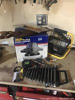 MVP Pro-Tech buffer/polisher boxed, wrenches laid out, small accessories on workbench