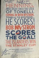 Full view of the signed poster showing printed text and player signatures