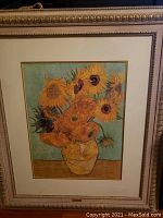 Full view of the framed artwork showing vase with sunflowers