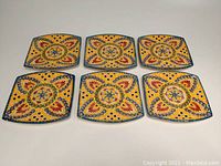 Six rectangular plates displayed in two rows, showing the full front design and pattern.