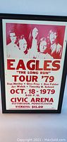 Full front view of framed Eagles concert print from 1979 tour