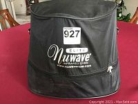 Black zippered carrying case for the Nuwave Elite Infrared Oven with white text and logo.