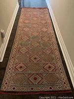 Full-length hallway view of the runner showing overall pattern and proportions