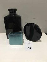 Photo of all three ceramic vases with different shapes and finishes