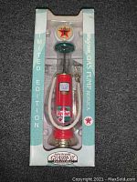 Front view of die cast Wayne Texaco fuel pump model in original packaging featuring Texaco branding and limited edition label.