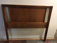 Front view of the twin headboard showing wood grain and construction details.