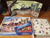 Full spread playboard set up behind the playset box showing background illustration.