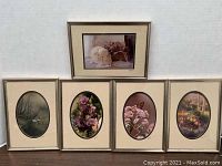 Five framed Barry Gamow signed prints with floral and still life themes, shown on wall.