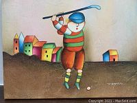 Full view of the acrylic painting showing a child playing polo with colorful houses in the background.