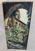 Close-up of watercolor painting showing detailed architectural archway, colonnade, and garden with palm trees