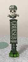 Front view of the Amsterdam Brewing Cruiser All Day Pale Ale beer tap handle featuring a skeleton with helmet and the text on the handle visible.