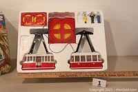 Complete Mountain Master cable car set in original styrofoam packaging showing cars, pulley system, string, and figures