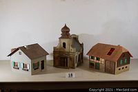 Lot of three G scale buildings on a plain white backdrop including the POLA church and two houses