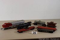Full view showing the variety of locomotives and rolling stock included in the lot