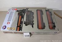 Boxed Lionel Pennsylvania Line battery toy train set showing window with visible train parts inside