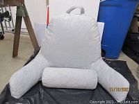 Front view of the Musband bed rest pillow seat with arms and attached bolster pillow.
