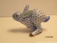 Side angle showing running pose and fishnet pattern