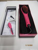Pink Royale hair styling straightening brush in box with instructional leaflet