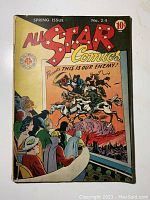 Front cover showing logo, artwork and cover wear