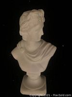 Front view of the white miniature bust statue depicting David's head and shoulders on a pedestal base.