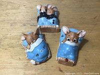 Set of three Pendelfin mouse figurines showing overall composition and detail