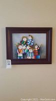 View of entire framed painting showing six cartoon-styled children playing musical instruments