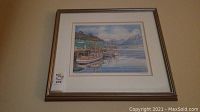 Full view of framed watercolor on wall