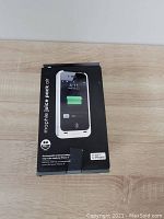 Front view of one Mophie Juice Pack case box showing product image and branding