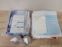 11 packages of ASONA mask storage boxes, 2 per package, and 2 pump bottles of Safe Cleaner hand sanitizer, 500 ml each