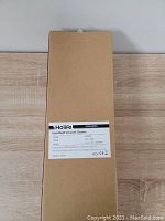 Closed cardboard box labeled Holife Handheld Vacuum Cleaner model HM164A.