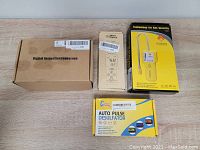 Lot items boxed: Digital Inspection Endoscope, Smart Sensor Electric Magnetic Field Tester S1392, Auto Pulse Desulfator, Combustible Gas Detector Y201