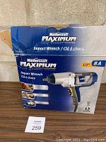 Box packaging showing product image and details including 1/2 inch drive, 8 amp motor, single speed 2100 RPM, 350 ft-lbs torque, and aluminum alloy housing