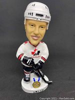 Front view of Ryan Smyth bobblehead in Team Canada hockey gear with gold medal depiction on base